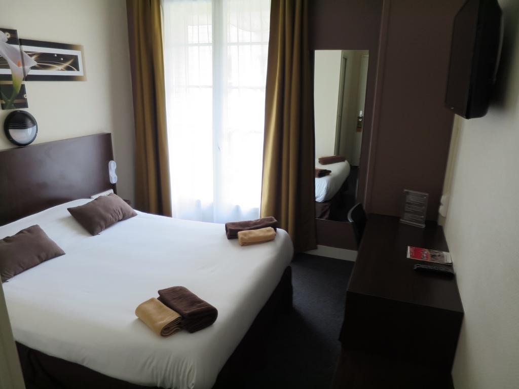 Hotel De La Paix Καν Δωμάτιο φωτογραφία